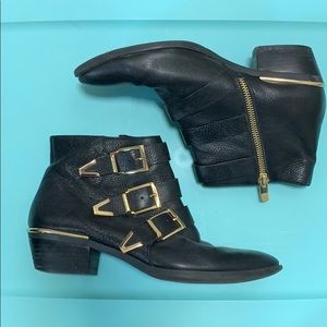 Vince camuto black and gold booties